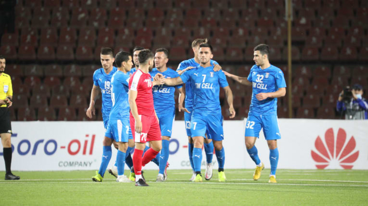 Nine Altyn Asyr players stand against Hudjand in the first match of 2021 AFC Cup