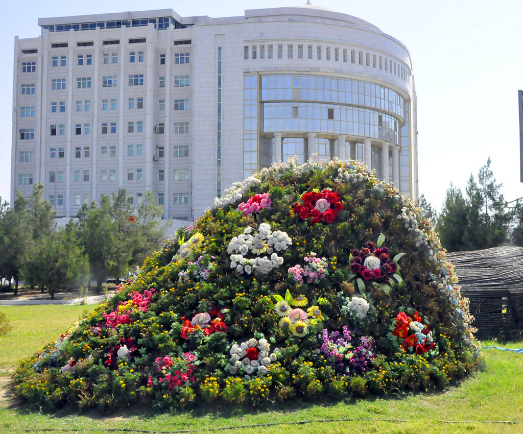 “… A big shadowy garden against the background of high mountains”