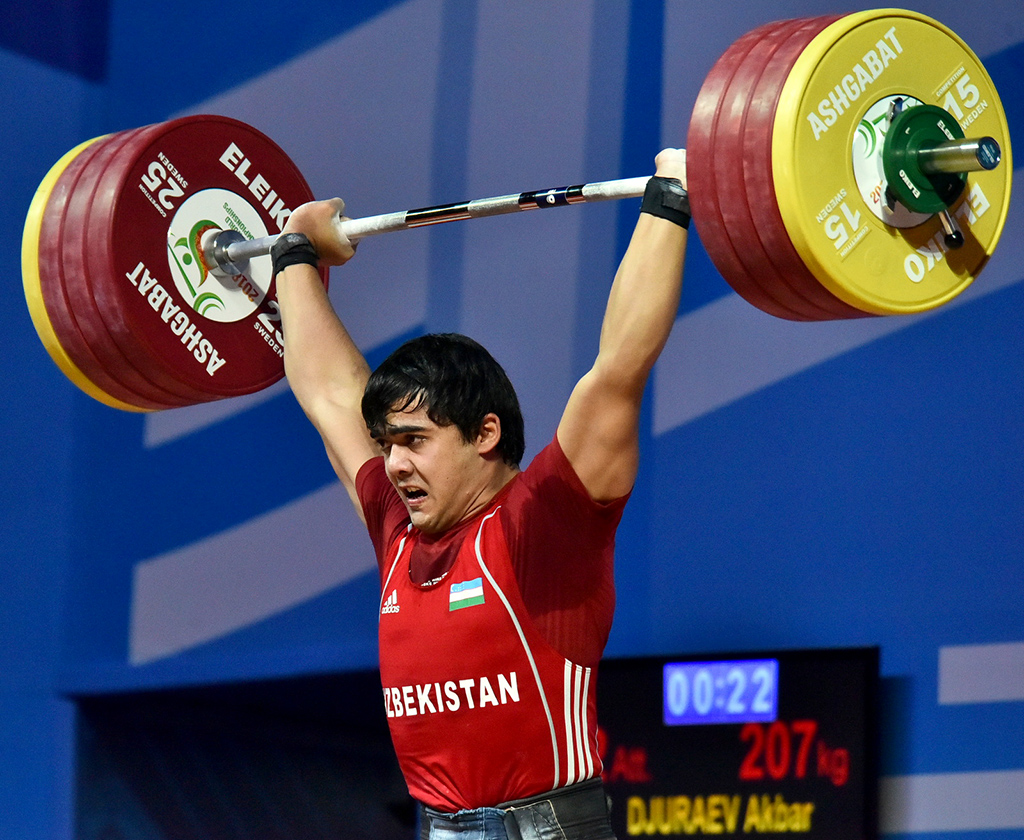 Weightlifters from Uzbekistan, Iran and Ukraine contest for leading positions in 102 kg weight category