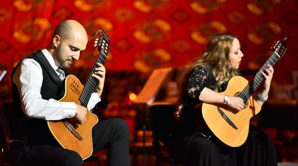 Ashgabat citizens listen to the performance of Zamfirescu trio and Adrian Nuar singer from Romania