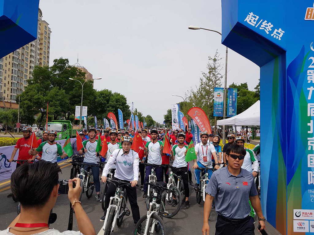 Turkmen diplomats and students take part in the 9th Beijing International Cycling Tour