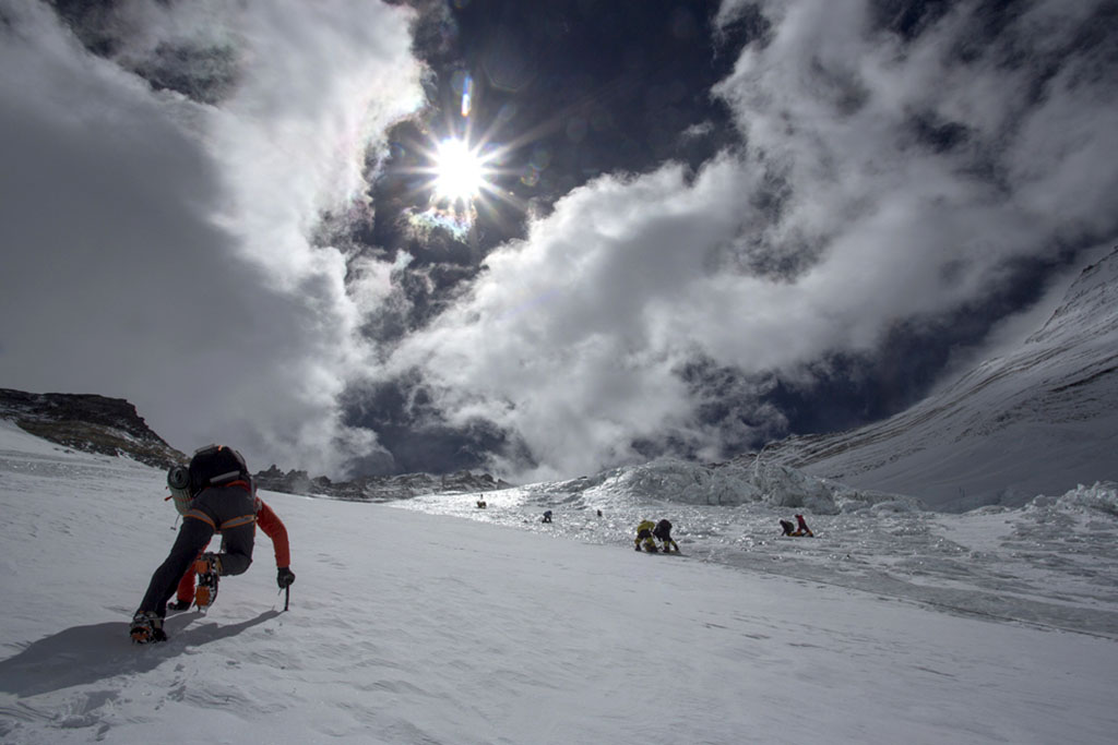 Flag of Turkmenistan is raised to the world's highest mountain - Mount Everest 