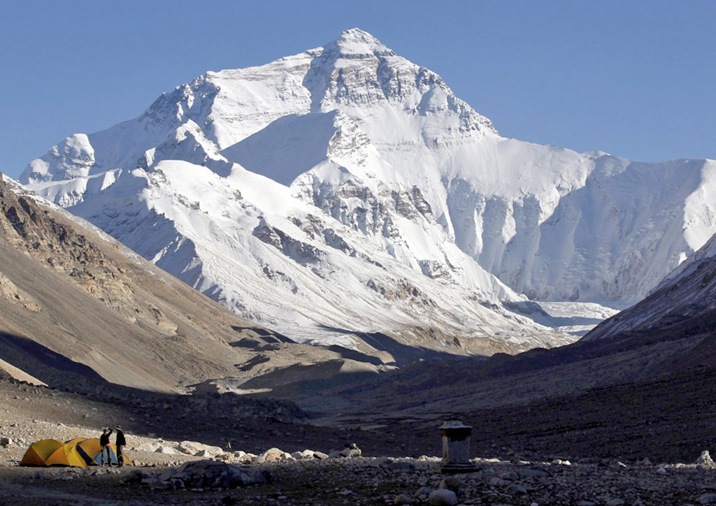 Flag of Turkmenistan is raised to the world's highest mountain - Mount Everest 