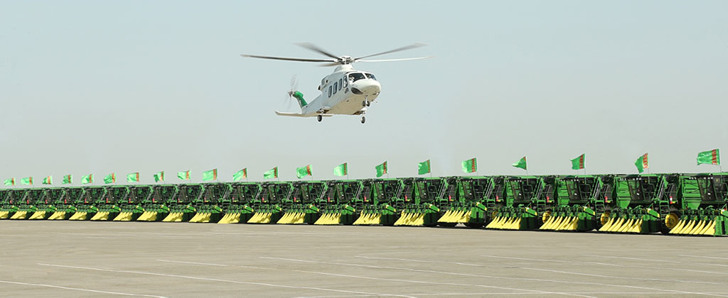 Turkmen leader inspects new shipment of John Deere harvesters and visits construction sites of the capital 